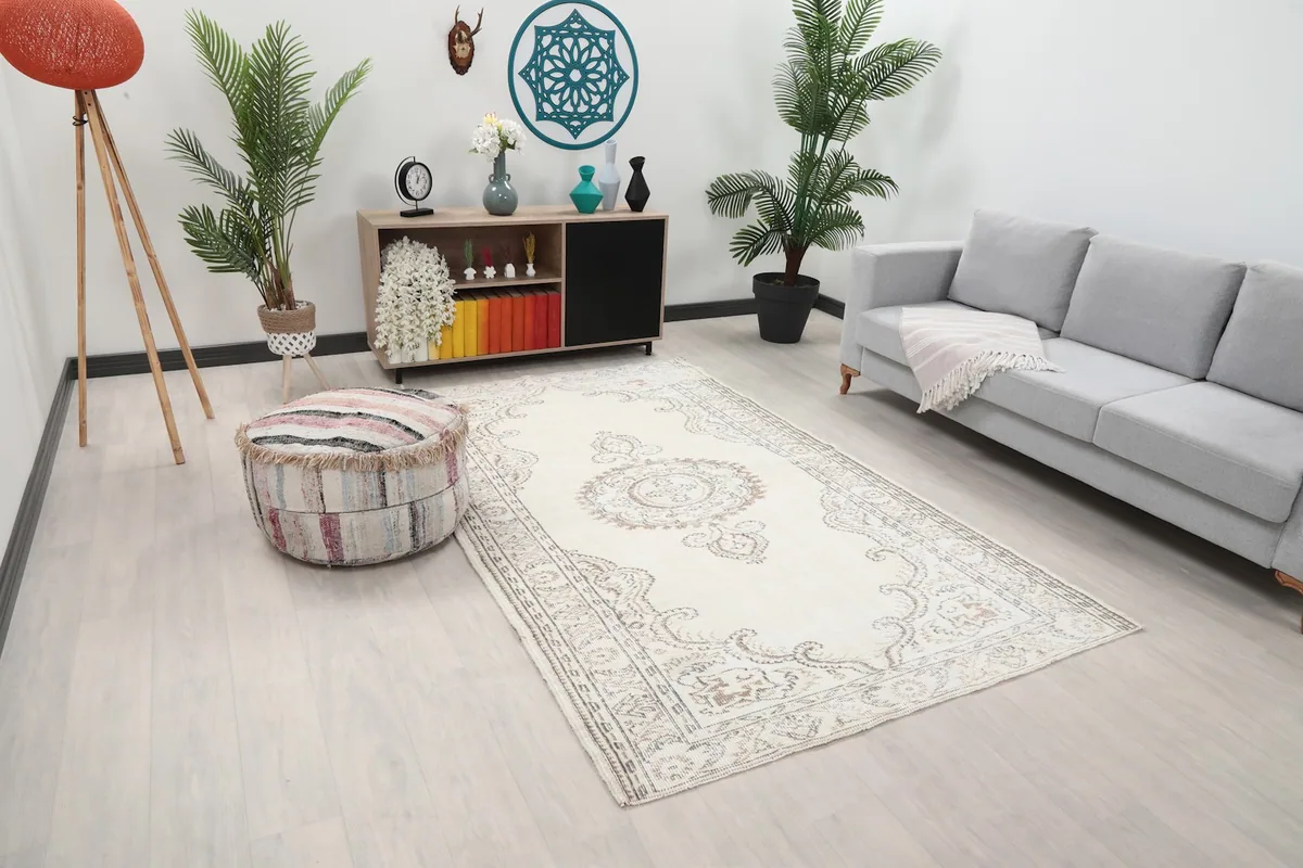 Wide view of the ivory area rug in a modern living space, showing its size in context