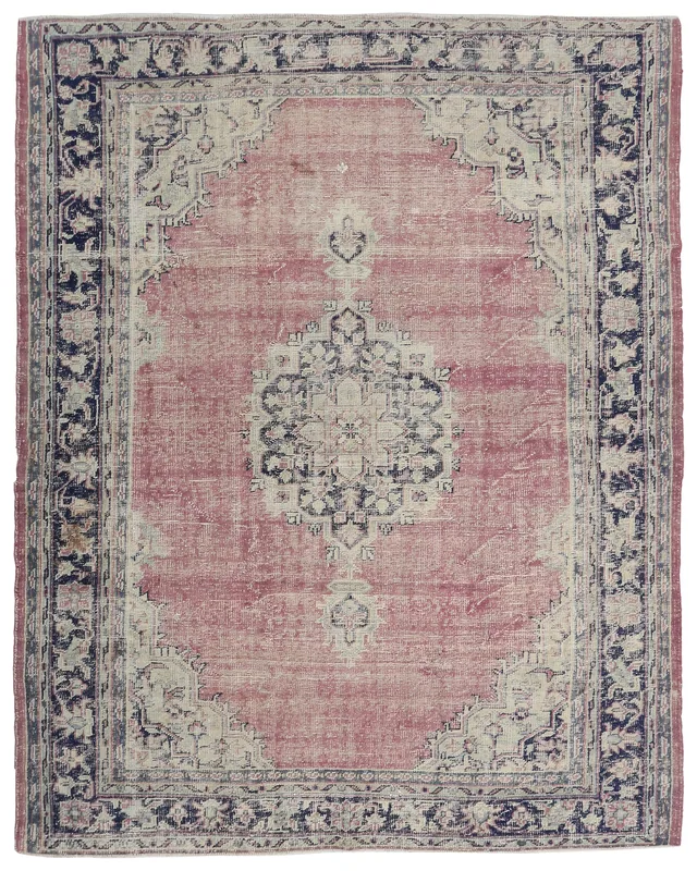 Full top view of the 6'9" x 8'6" rose and navy vintage Anatolian rug