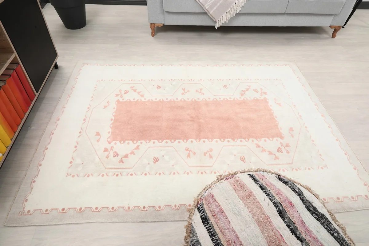 Overhead view of the entire rug in the room, capturing its overall size and design