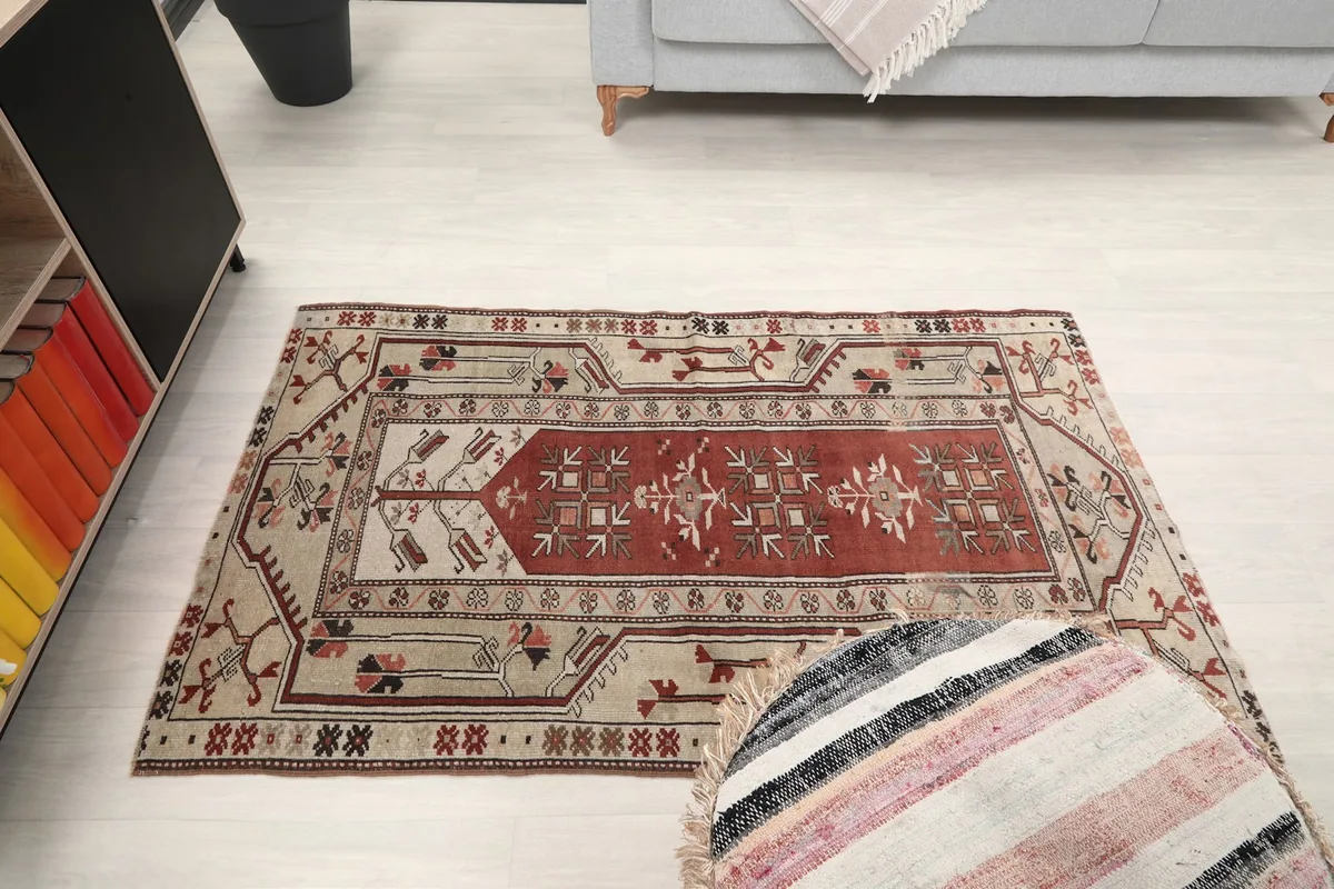 Wide shot of the rug in the living room, showing its placement relative to furniture