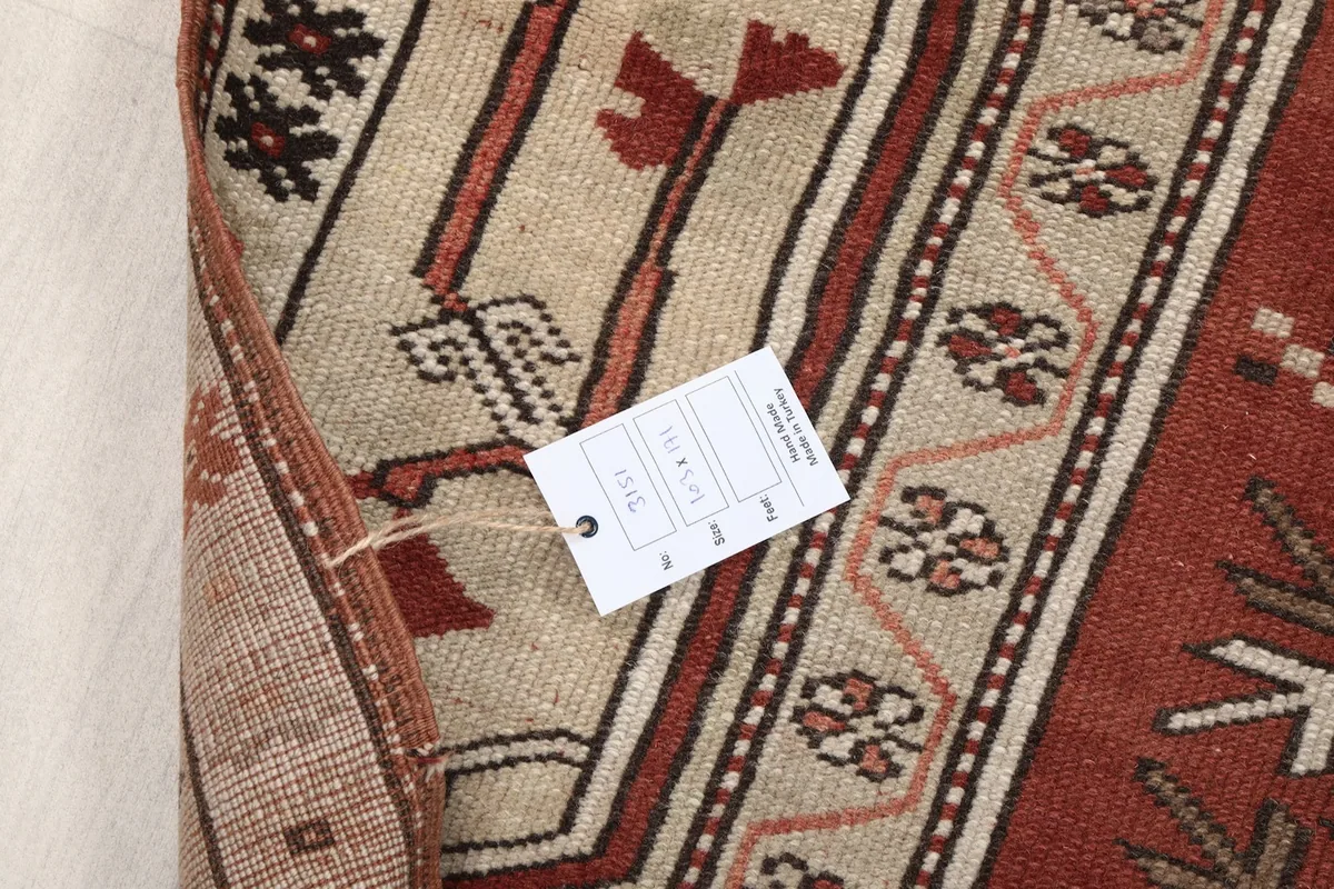 Close-up of the rug's reverse side with a product tag attached