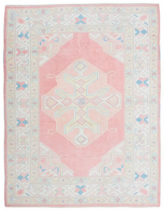 Full top view of the 6'4" x 8'7" pink and beige vintage Anatolian area rug