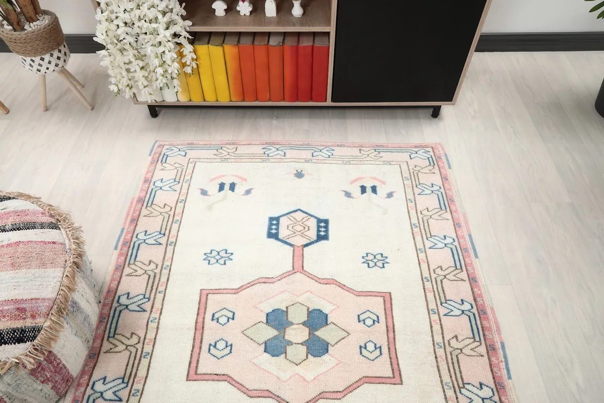 Room view of the rug from another angle, showing its placement relative to furniture