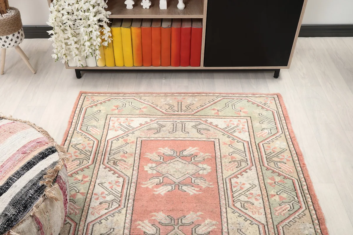 Overhead view of the rug in a room setting, showing its placement relative to furniture