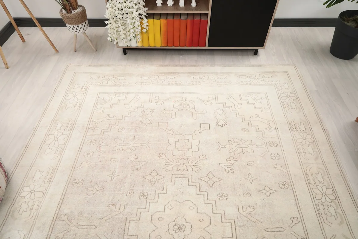 Overhead angle of the rug in a room, emphasizing its size and how it anchors the space.
