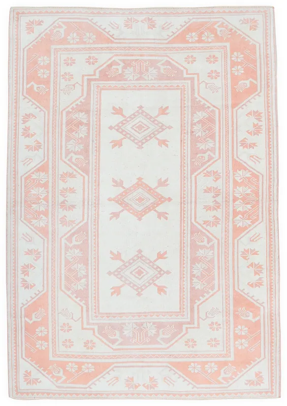 Full overhead view of the ivory and rose vintage Anatolian area rug