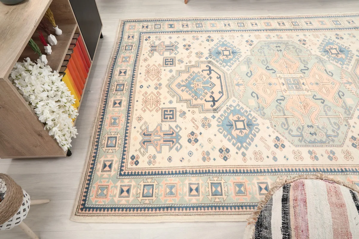 High-angle view of the rug's surface, capturing the subtle variations in color and texture.