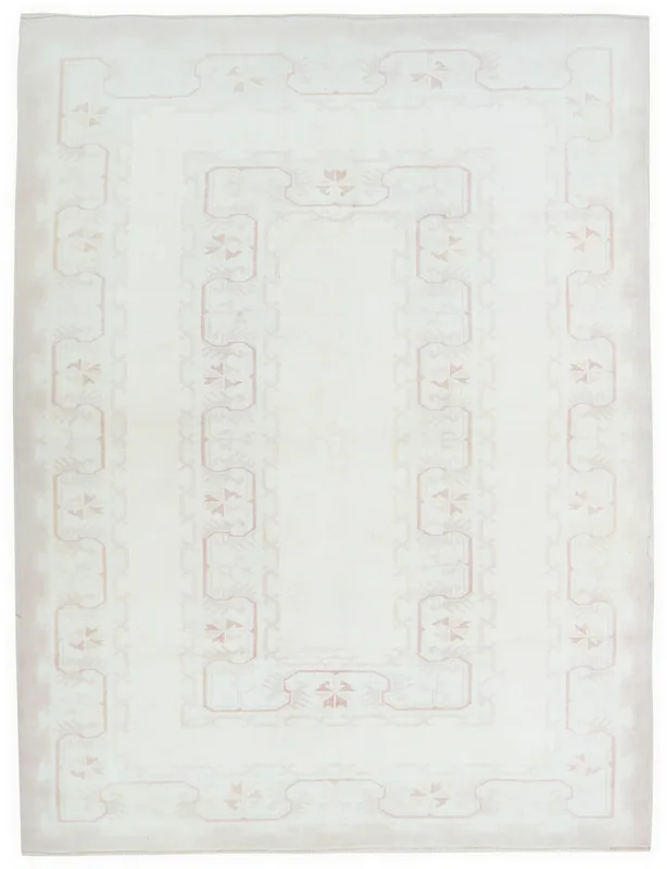 Full top view of the 6x9 cream and rose geometric vintage Anatolian area rug