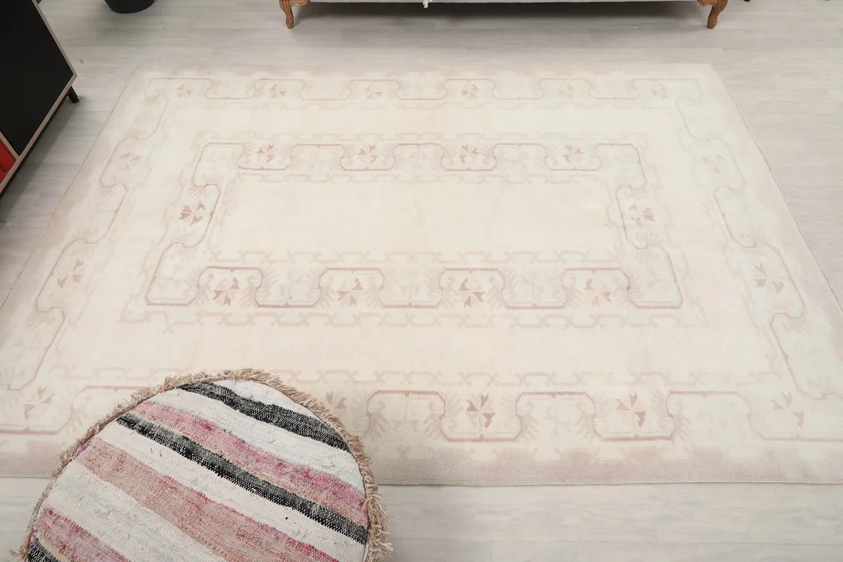 Another angled view of the rug, emphasizing its medium size and geometric design