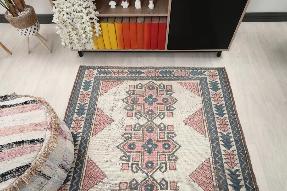 Overhead view of the rug in a room, showing its full length and interaction with surrounding decor