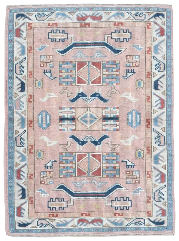 Top view of a 3'1" x 4'4" rose area rug with tribal bird motifs on a white background.