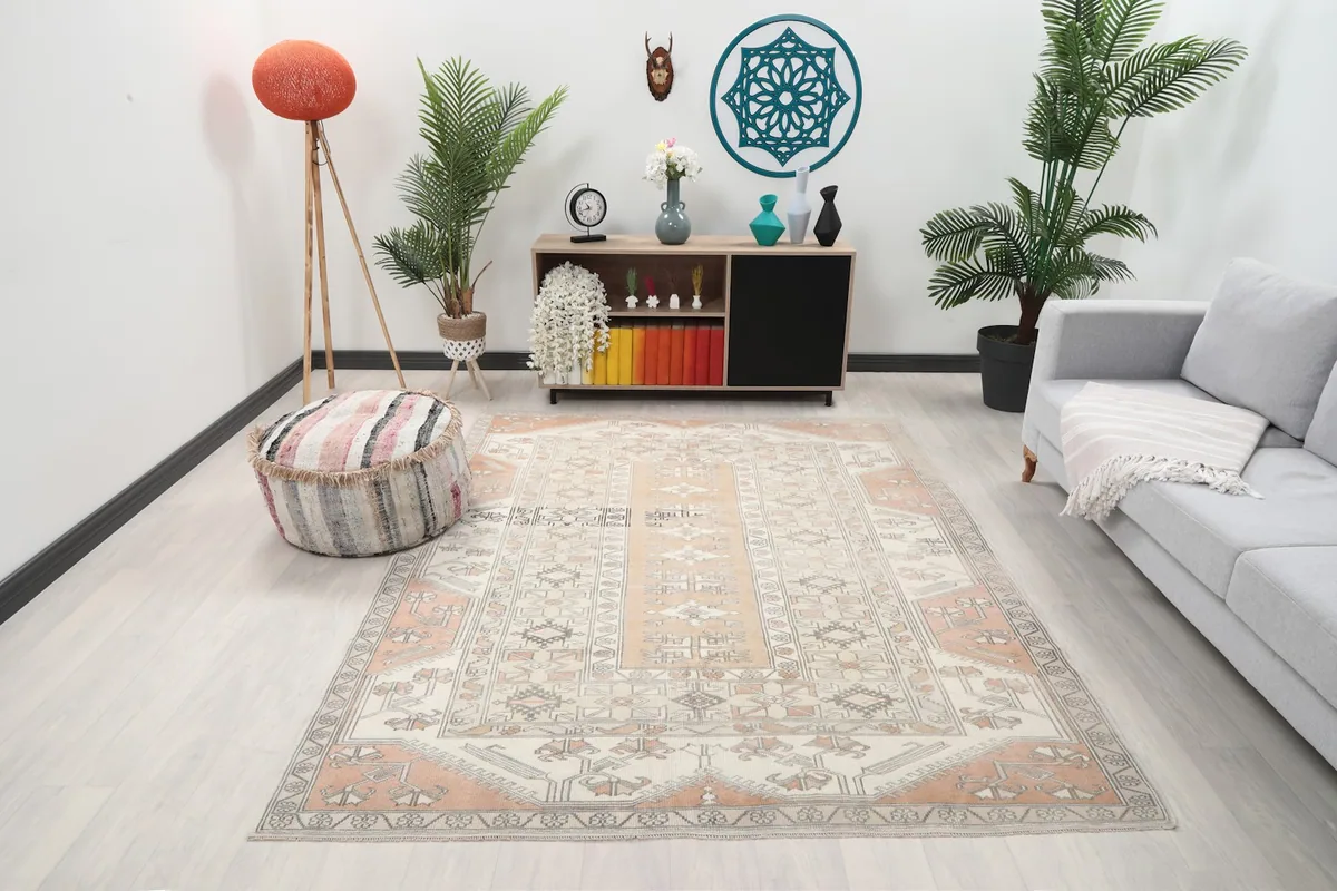 Vintage Anatolian rug in a modern living room setting with light furniture