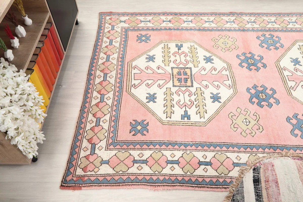 Side angle of the rug showing its full design and colors in a room setting