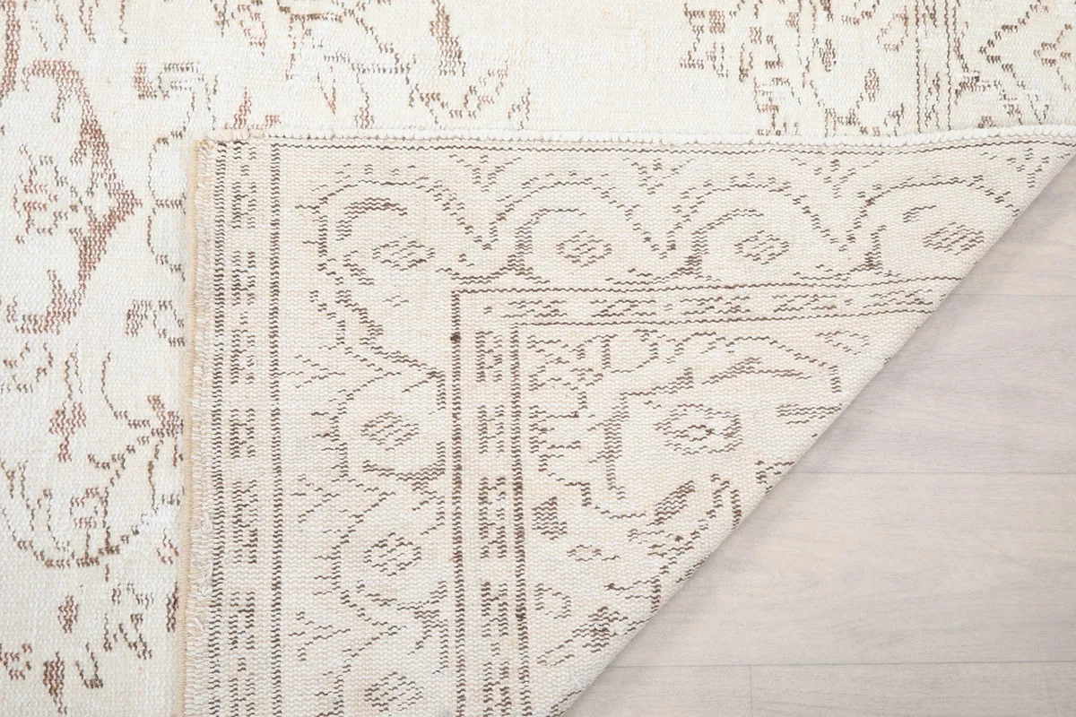 Another view of the rug's back, showing the consistent knotting and the quality of the craftsmanship.