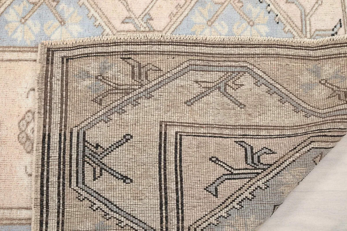 Close-up of the back of the rug, showing the dense knotting and craftsmanship.