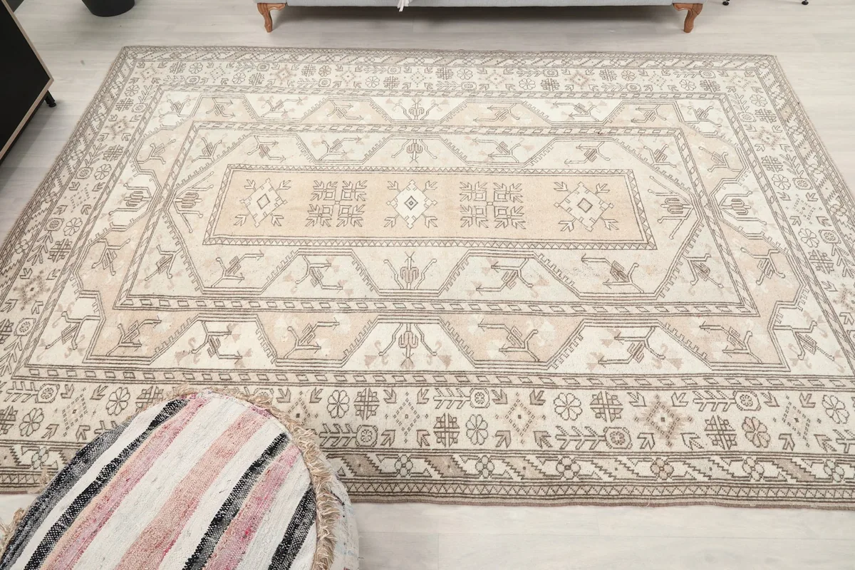 Full overhead perspective of the vintage rug, capturing its complete design