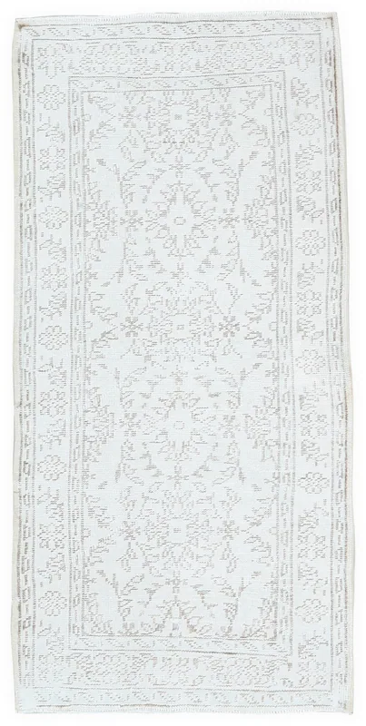 Full top view of the ivory and beige geometric Anatolian runner rug on a white background