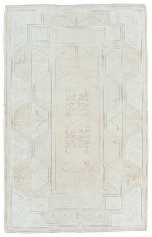 Full top view of the 4x6 ivory tribal geometric vintage Anatolian rug