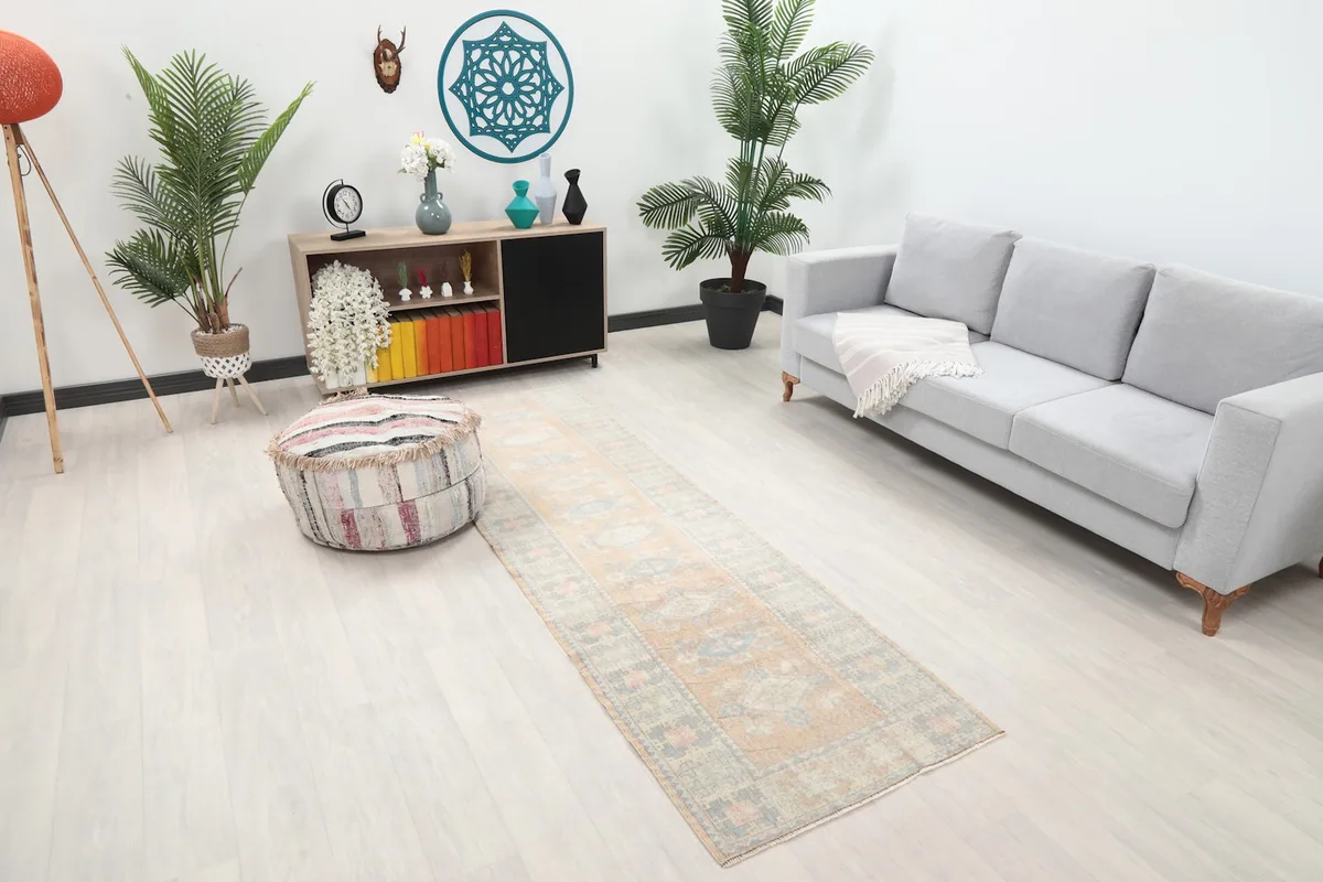 Angle view of the tan geometric runner rug in a modern living space