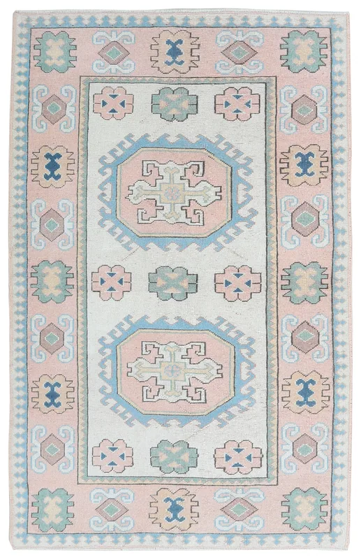 Pink Geometric Anatolian Rug, full top view showing its soft colors and tribal design.
