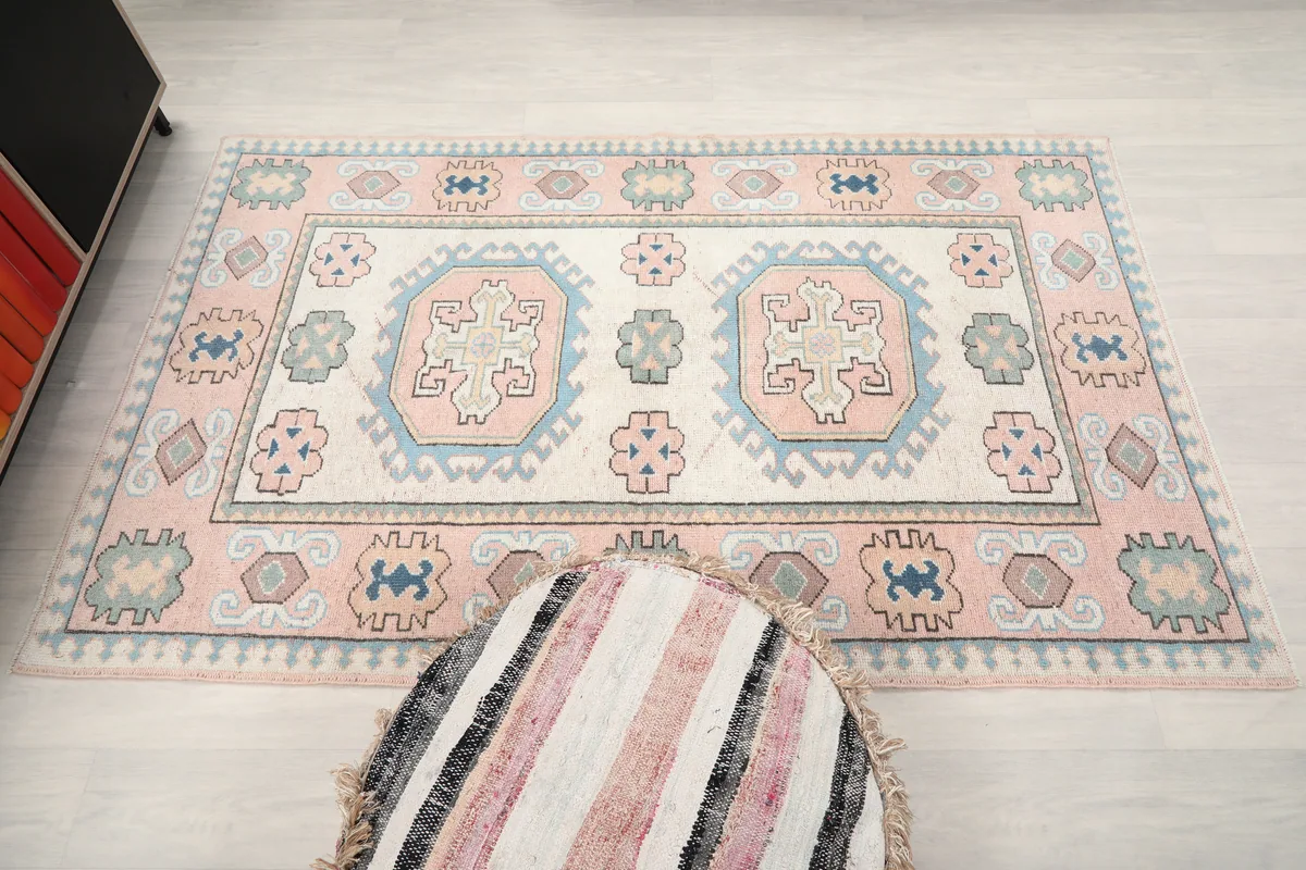 Overhead view of the Pink Geometric Anatolian Rug, clearly showing the full design and color palette.