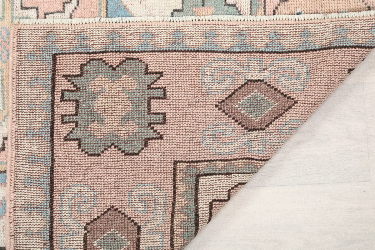 Reverse side detail of the Pink Geometric Anatolian Rug, illustrating the quality of the knotting.