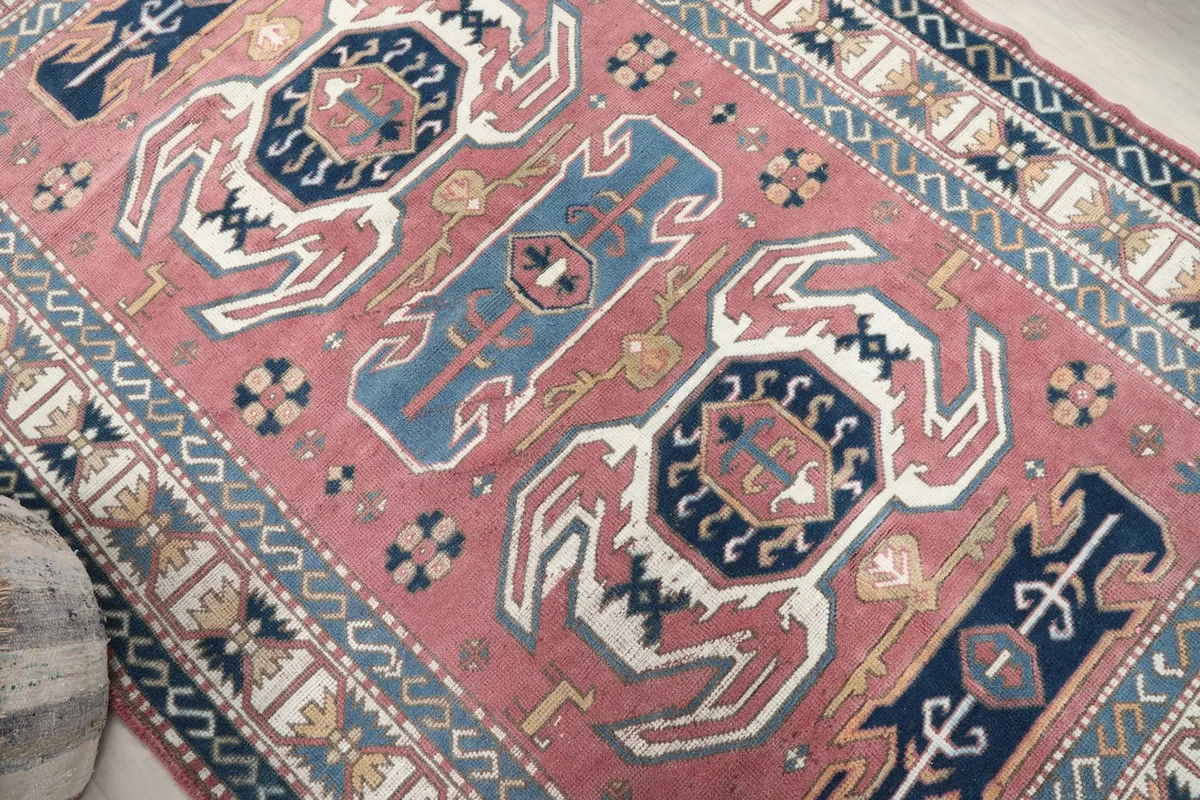 Overhead angle shot highlighting the central rose field and tribal geometric designs