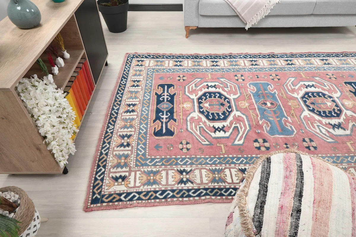 Rug positioned in a living space, offering a perspective of its size and design impact
