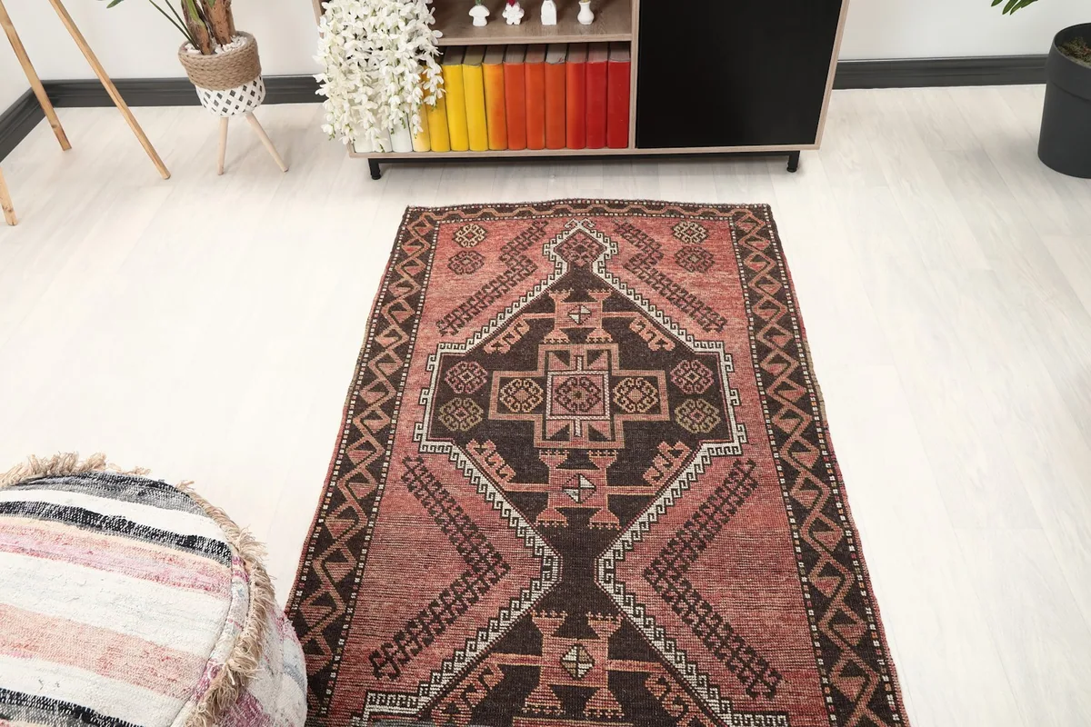 Overhead view of the runner rug showcasing its full design and colors in a room setting