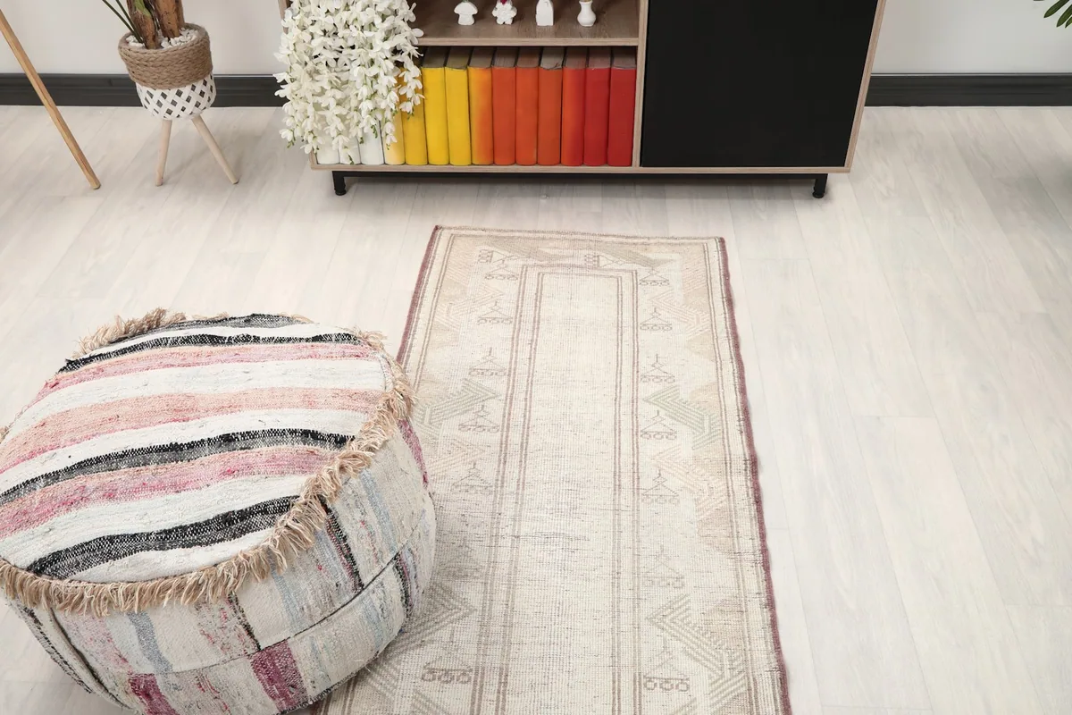 View of the rug in a room, showing its placement relative to furniture and decor.