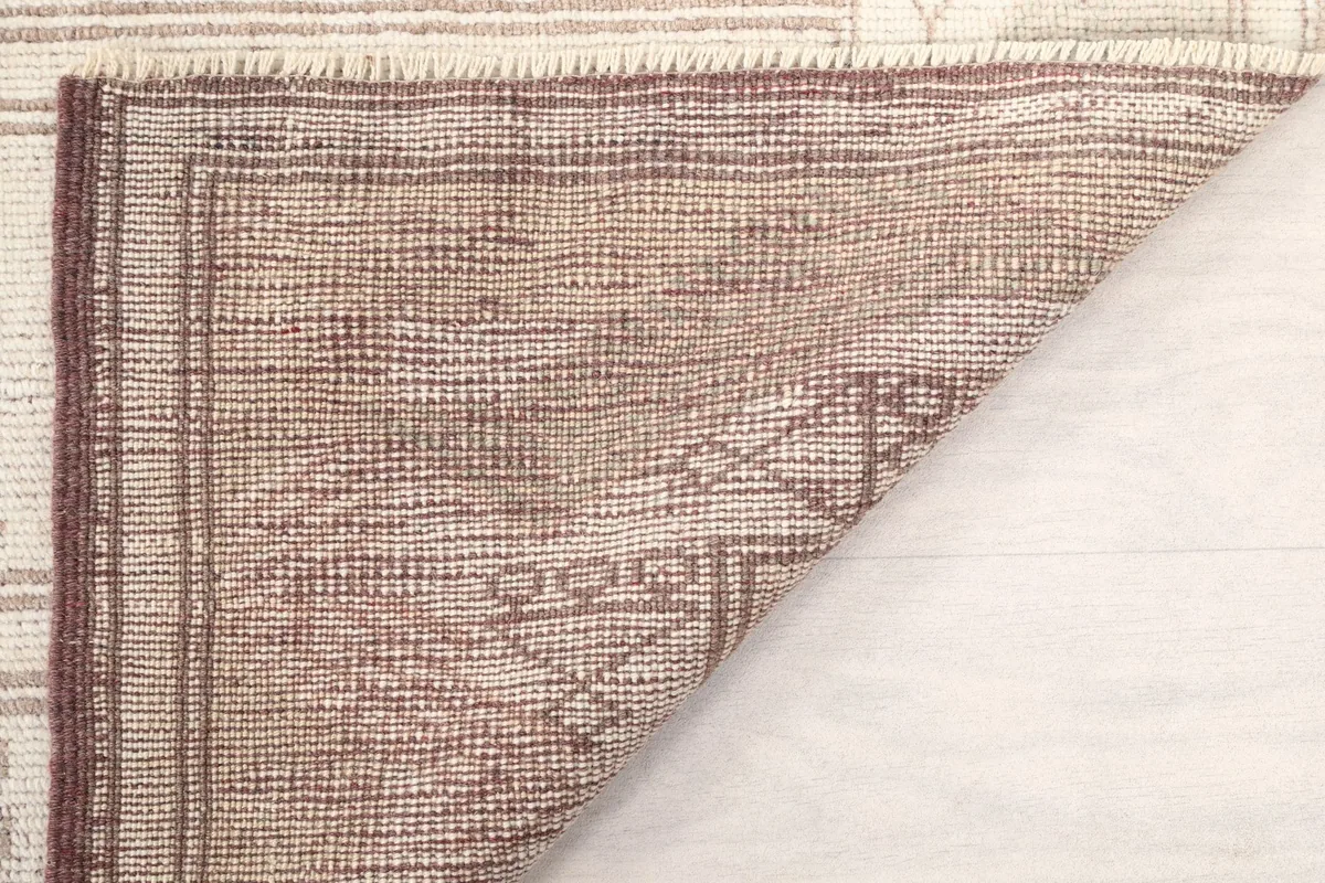 Another view of the rug's reverse side, showcasing the craftsmanship of the hand-knotted weave.