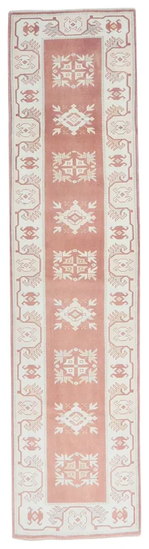Full overhead view of the rose and ivory vintage Anatolian runner rug