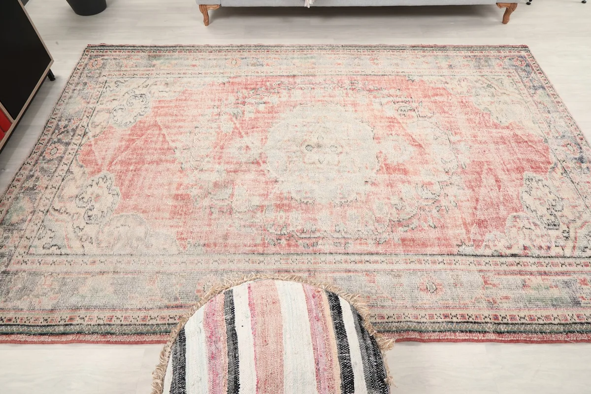 Full overhead view of the rose and gray medallion rug in the room setting