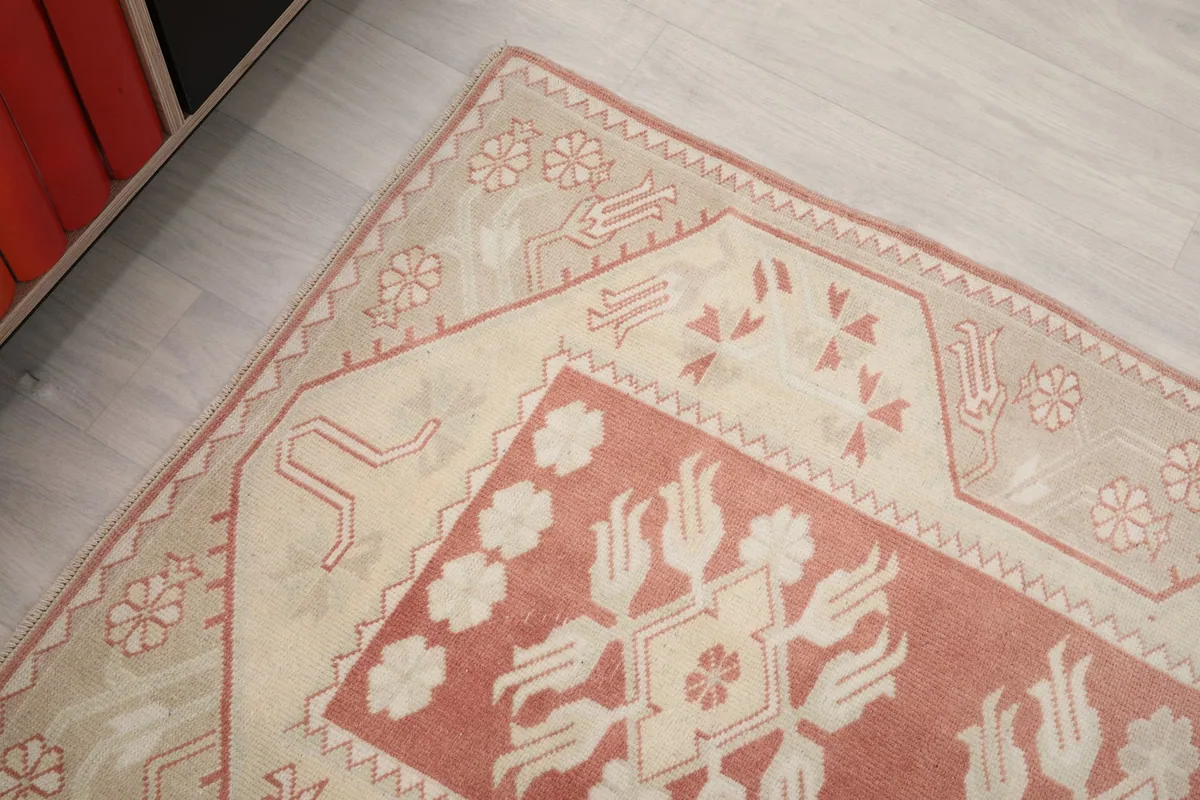 Angled close-up of the runner's end, showcasing the intricate geometric patterns and colors.