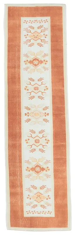 Full top view of the 2'8" x 9'9" rust and ivory geometric runner rug