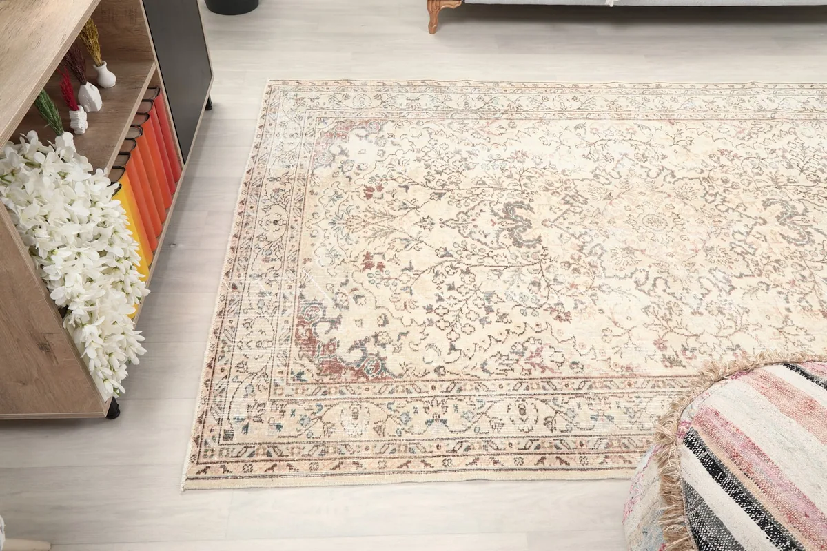 Wide shot of the ivory rug in the room, showcasing its overall impact and size relative to the space