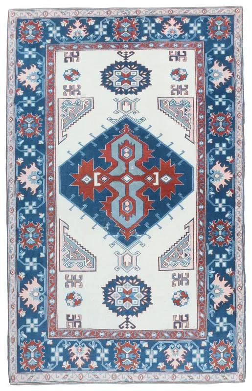 Full overhead view of the ivory and navy geometric vintage Anatolian rug