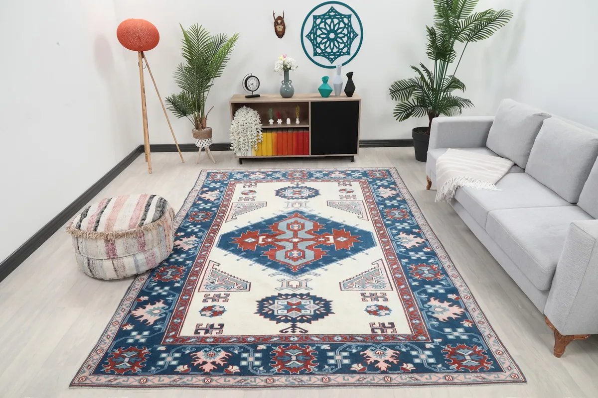 Ivory and navy geometric rug displayed in a modern living room setting