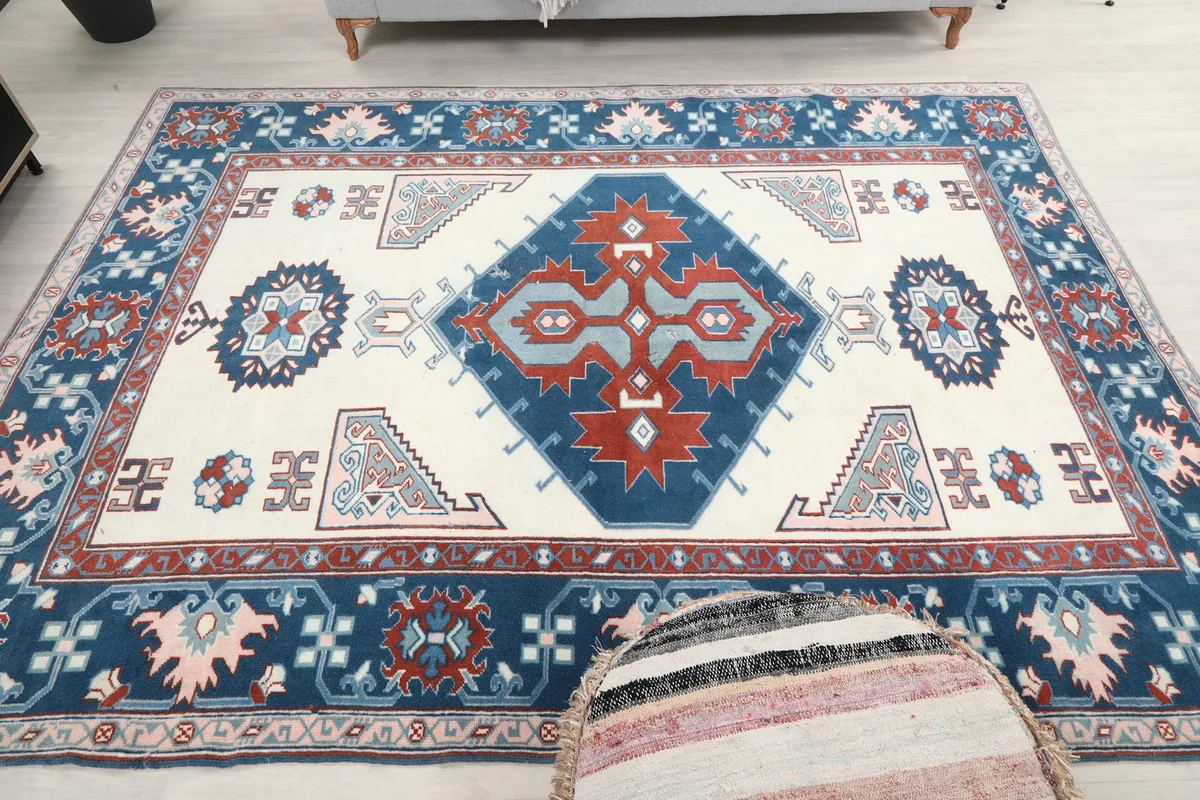 Slightly angled overhead view of the entire rug, emphasizing the central medallion
