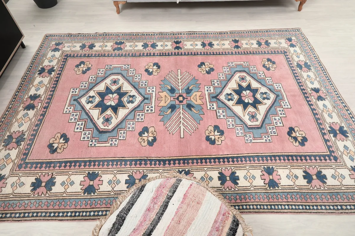 Overhead view of the entire rug in the room setting, providing a sense of its medium size.