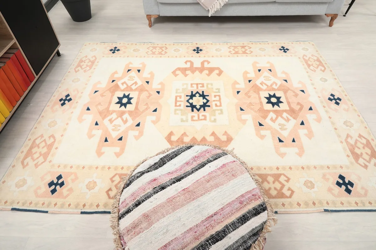 Full overhead perspective of the rug, emphasizing the symmetrical tribal medallion layout