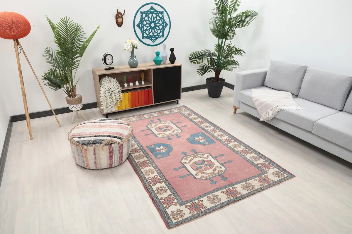 Area rug showcasing its rose and blue pattern within a contemporary living space