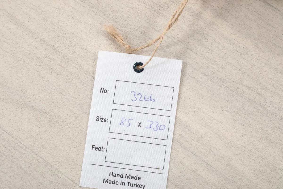 Product tag with rug number 3266 and size 85x330 cm, confirming handmade origin in Turkey
