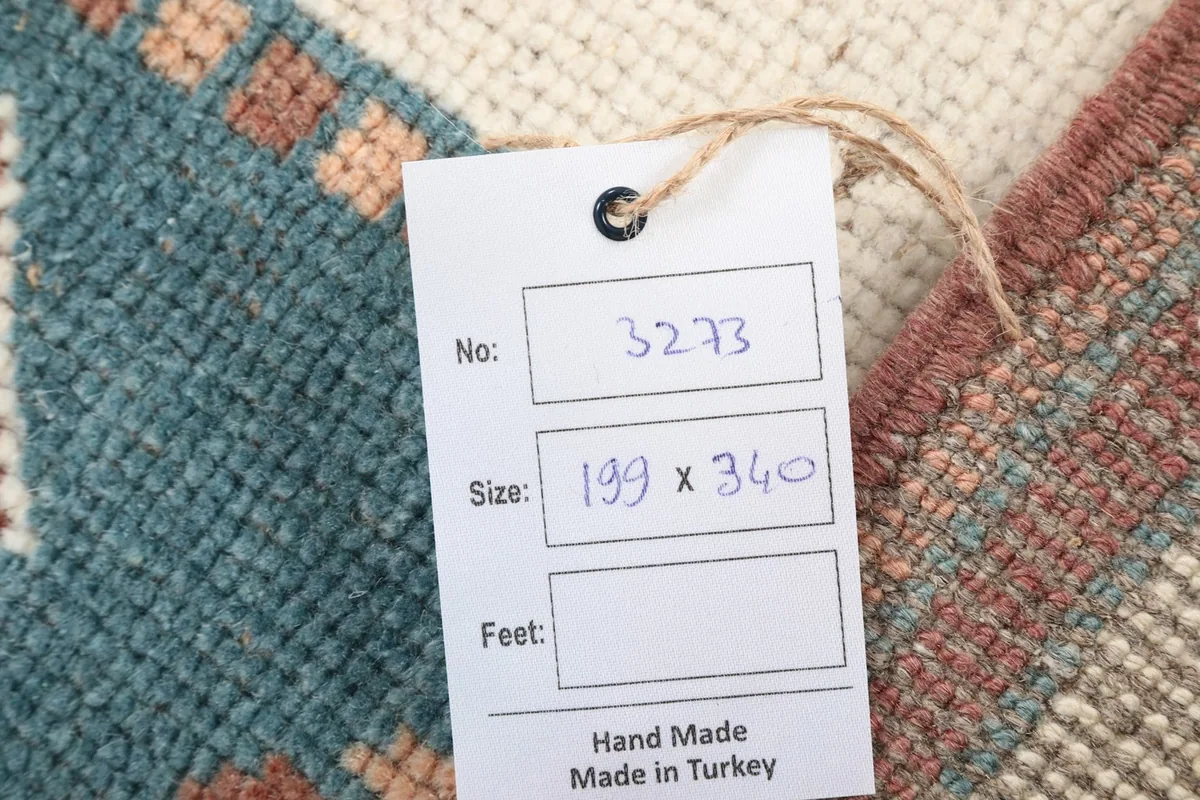 Tag with rug number 3273 and size 199 x 340 cm, indicating handmade in Turkey