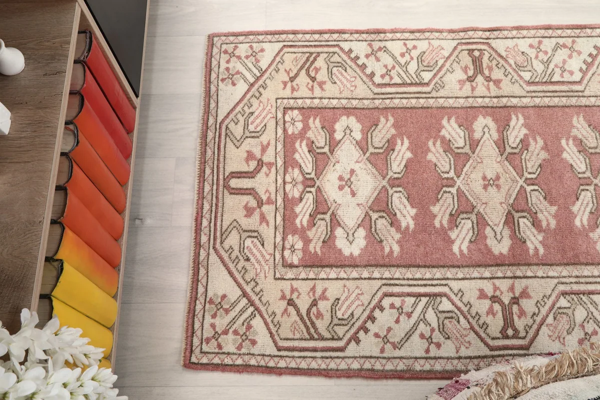 Angled view of the rug's surface, capturing the texture and color variations in the pile