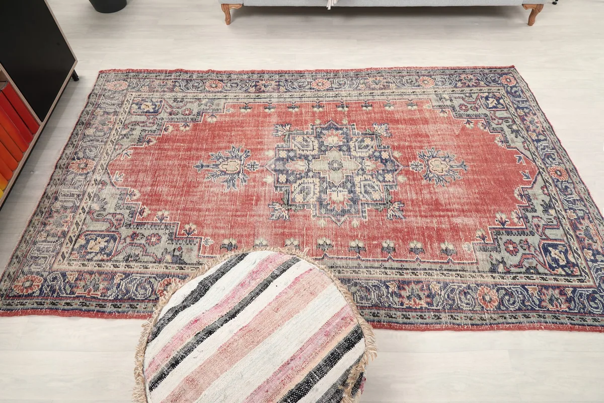 Overhead view of the rug, showcasing the full pattern and colors in a room setting