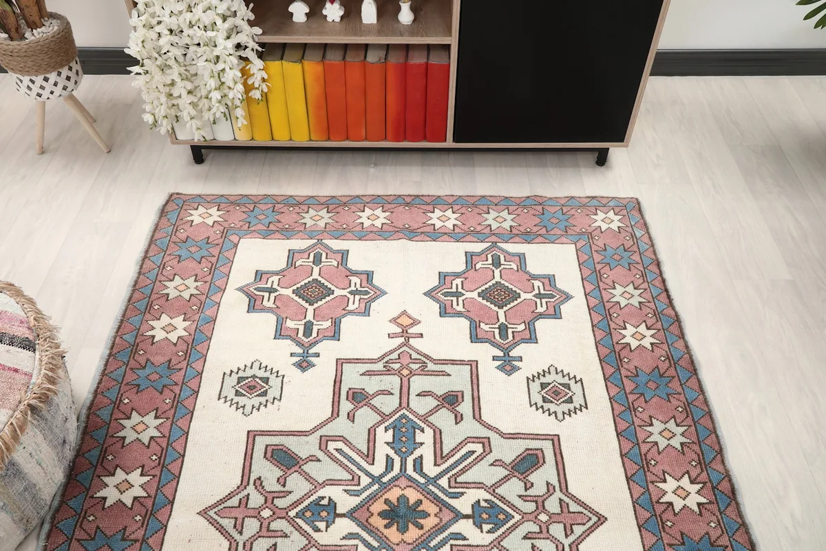 View of the rug in a room, focusing on the overall pattern and color scheme