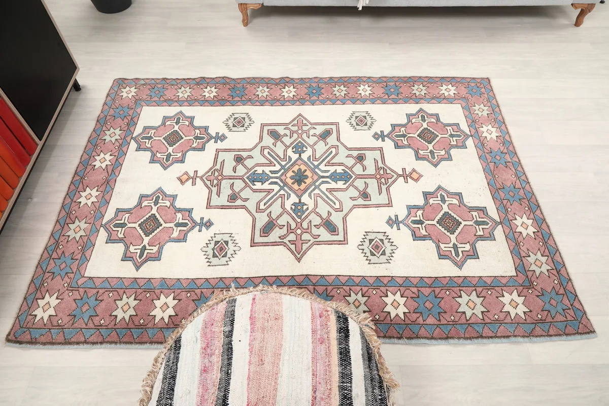 Full view of the rug from above in a room setting, emphasizing its area coverage