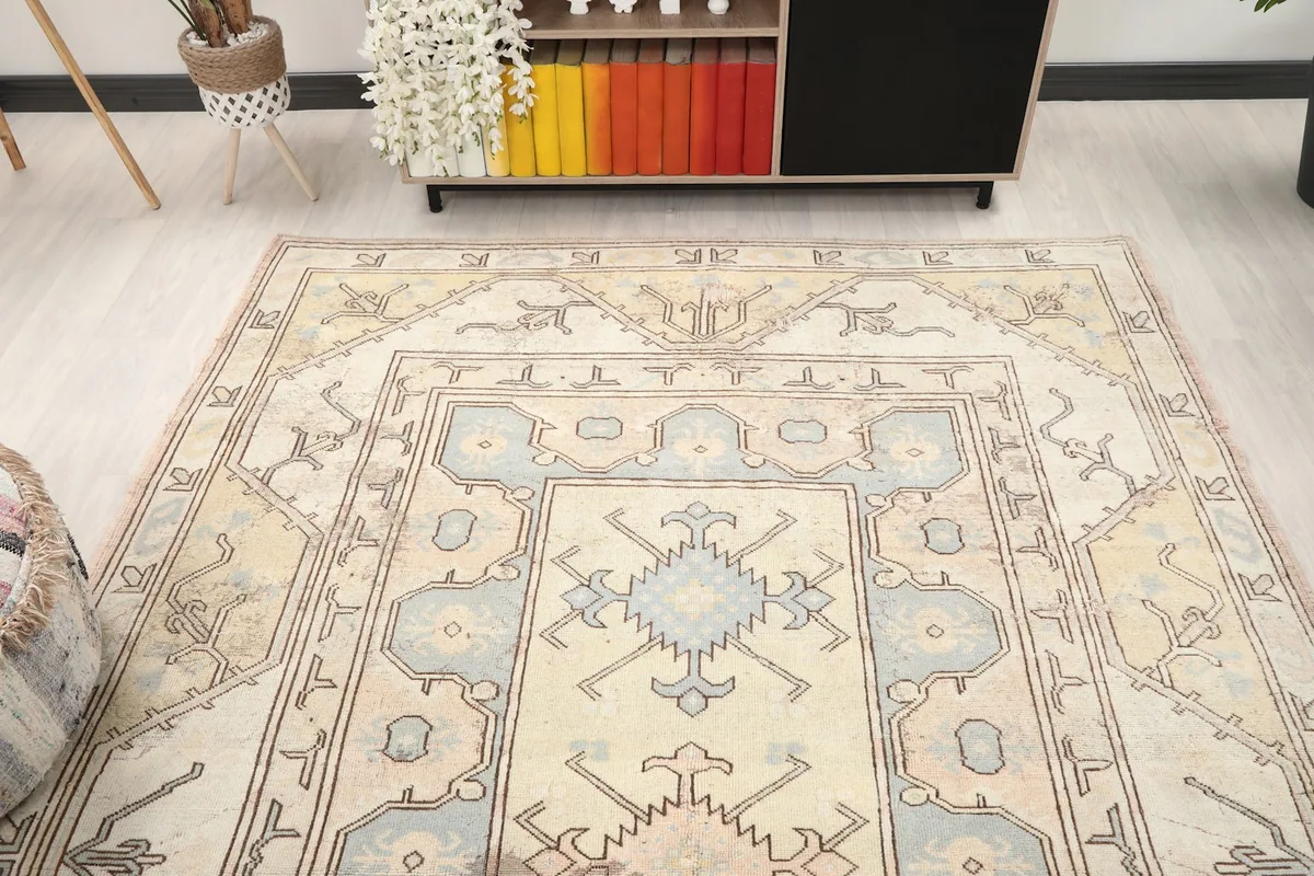 Full room view of the Anatolian rug, providing perspective on its size and how it anchors the living space.