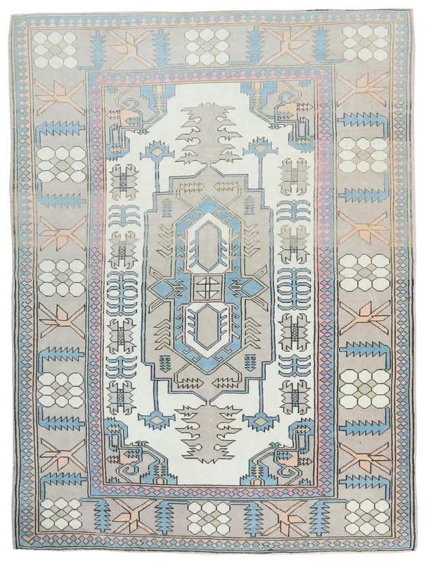 Overhead view of a vintage Anatolian hand-knotted gray and blue geometric tribal rug